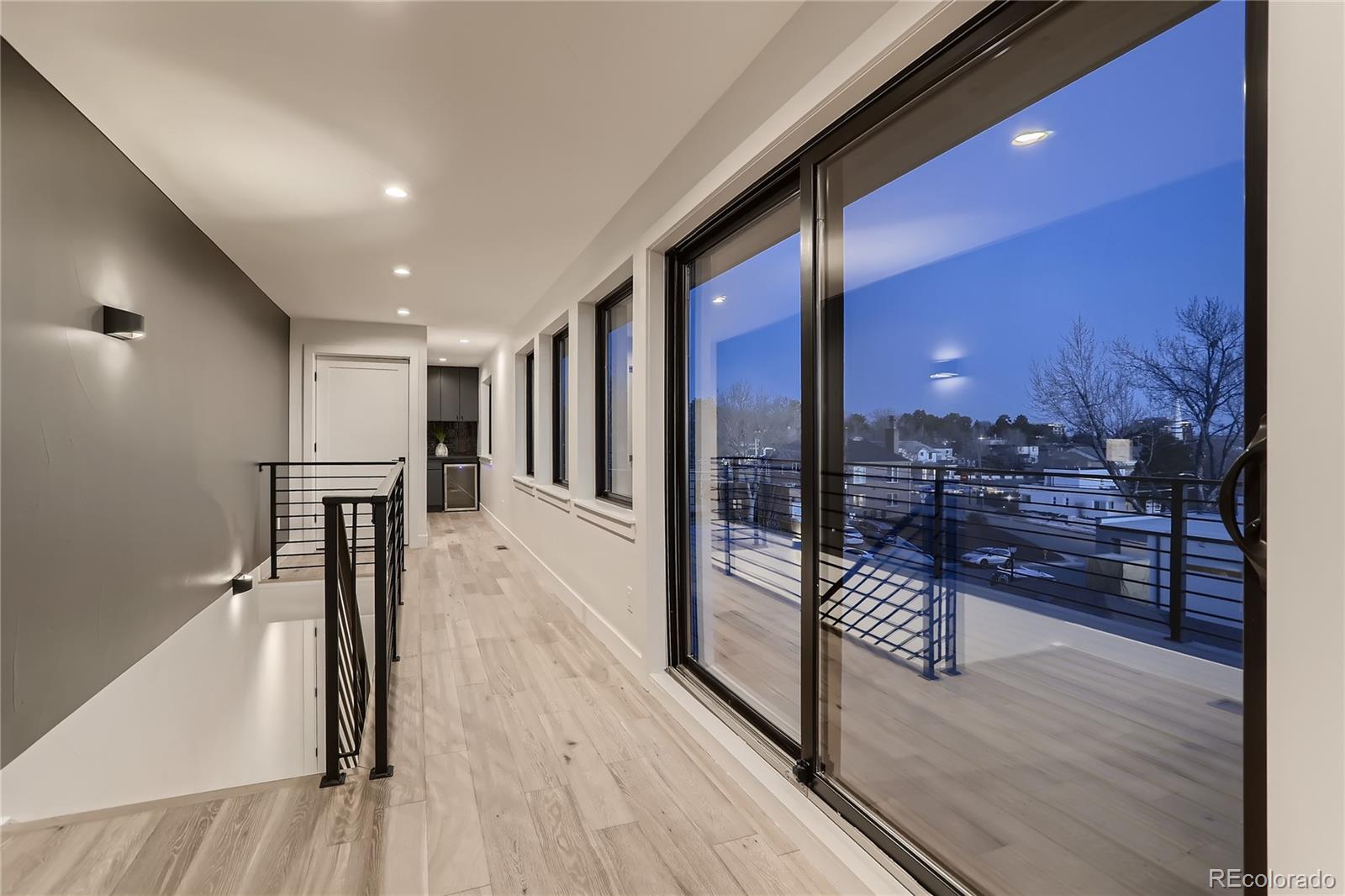 29 Harrison Street Denver, CO 80206 - Photo 23 of 40 a view of a room with wooden floor