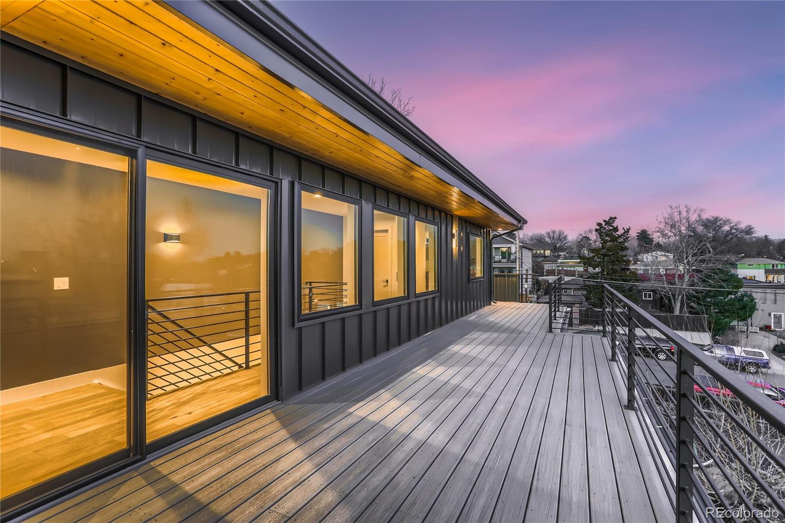 29 Harrison Street Denver, CO 80206 - Photo 31 of 40 a view of balcony with wooden floor