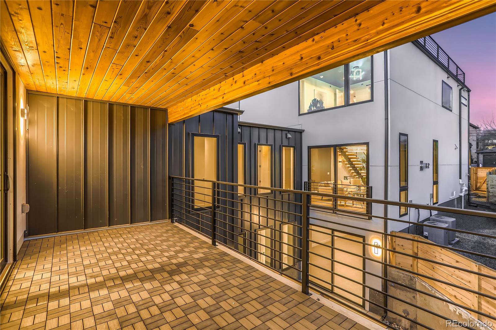 29 Harrison Street Denver, CO 80206 - Photo 33 of 40 a view of balcony with wooden floor