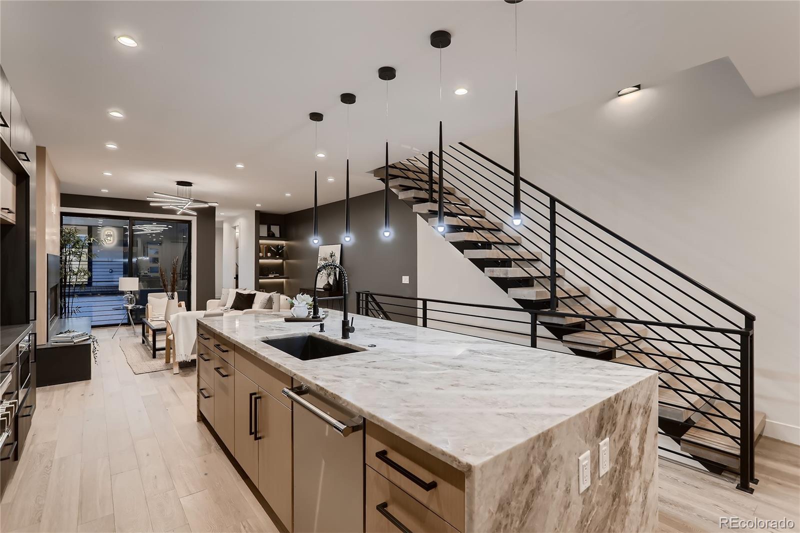 29 Harrison Street Denver, CO 80206 - Photo 7 of 40 a kitchen with sink and stove