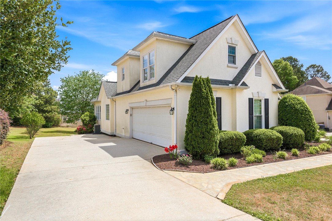 This residence features offers charming curb appeal.