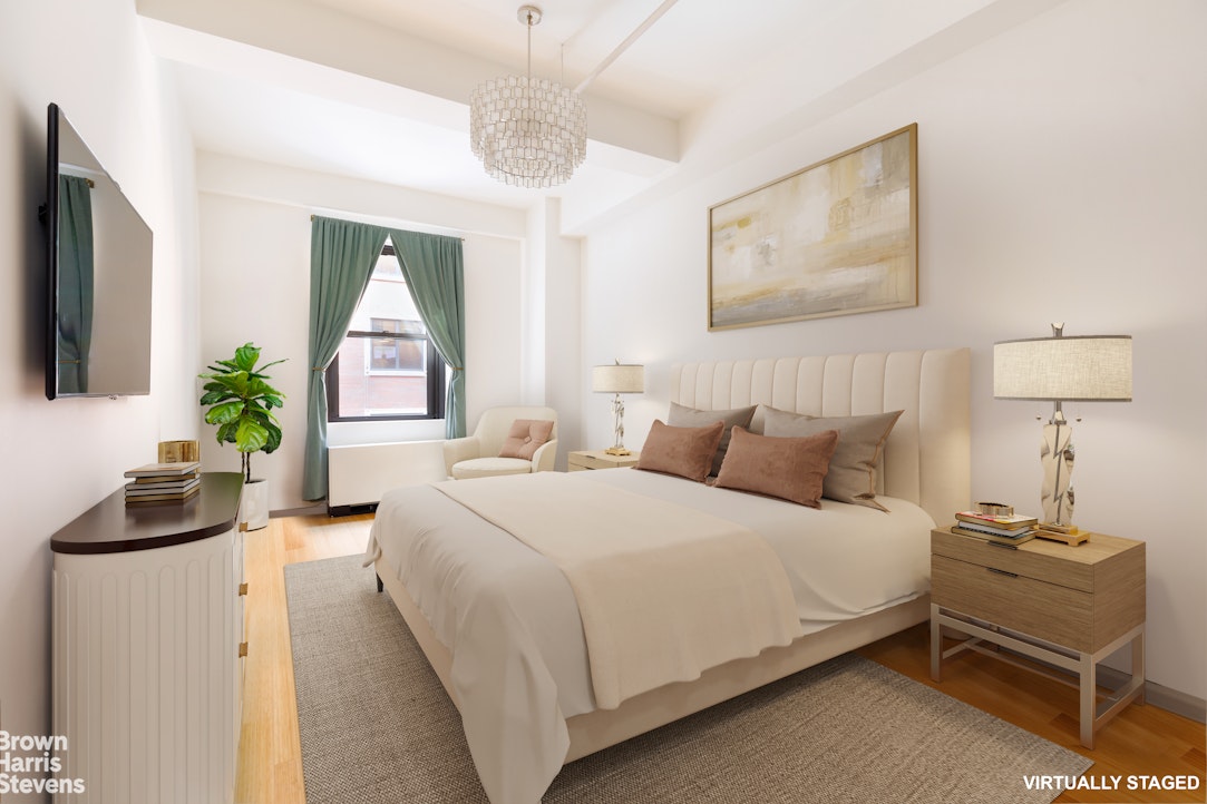 365 Bridge Street, Unit 3M Brooklyn, NY 11201 - Photo 3 of 12 a bedroom with bed and a window