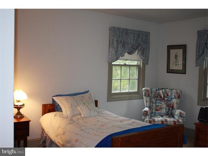 364 East Hillendale Road Kennett Square, PA 19348 - Photo 14 of 17 a bedroom with a bed and window
