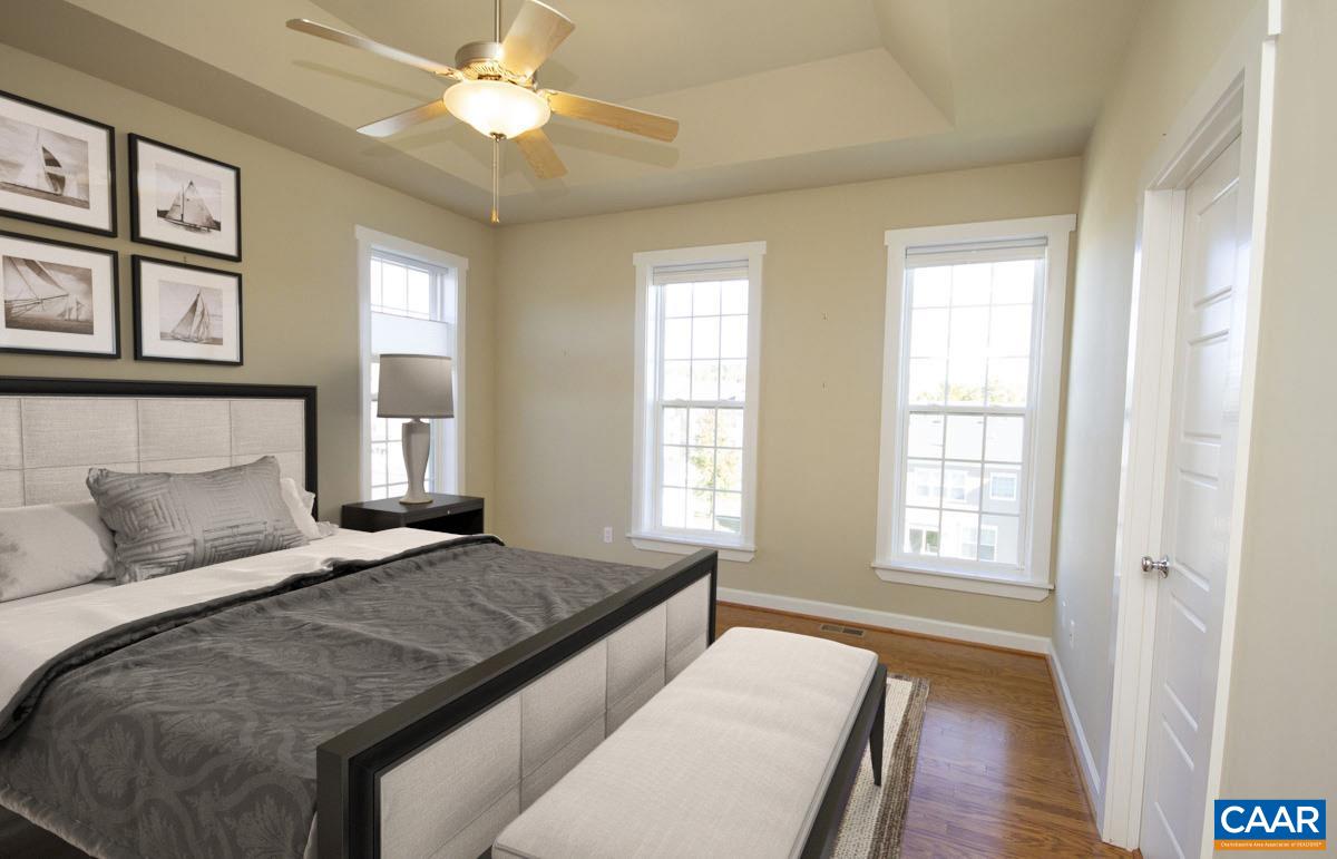 2095 Avinity Loop Charlottesville, VA 22902 - Photo 11 of 42 a bedroom with a large bed and a window