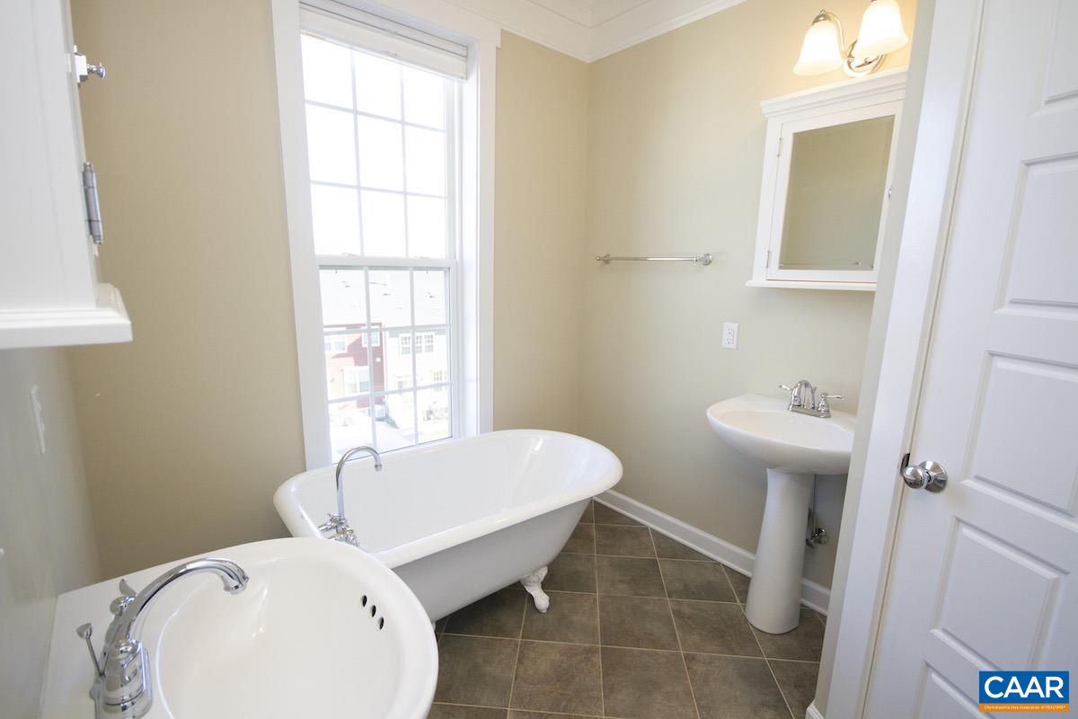 2095 Avinity Loop Charlottesville, VA 22902 - Photo 12 of 42 a bathroom with a sink mirror and toilet