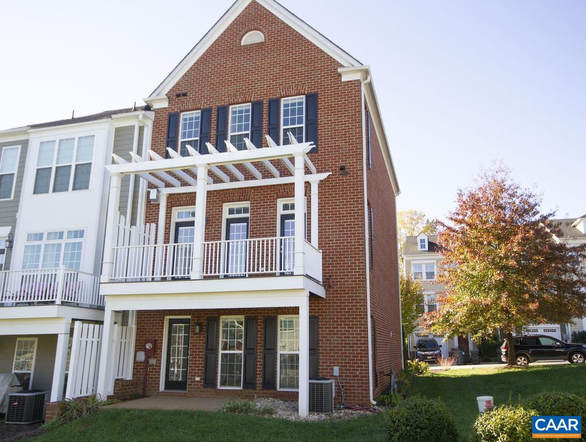 2095 Avinity Loop Charlottesville, VA 22902 - Photo 17 of 42 a front view of a building with garden