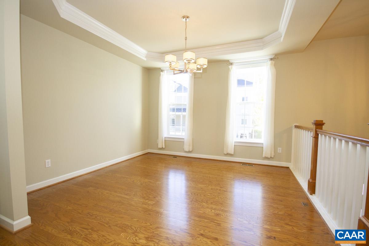 2095 Avinity Loop Charlottesville, VA 22902 - Photo 37 of 42 a view of empty room with wooden floor and fan