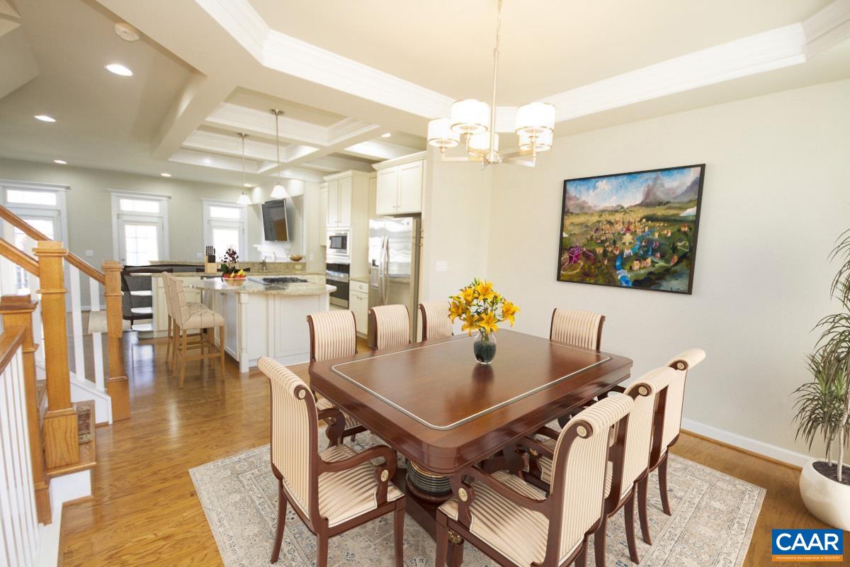 2095 Avinity Loop Charlottesville, VA 22902 - Photo 4 of 42 a view of a dining room with furniture and chandelier