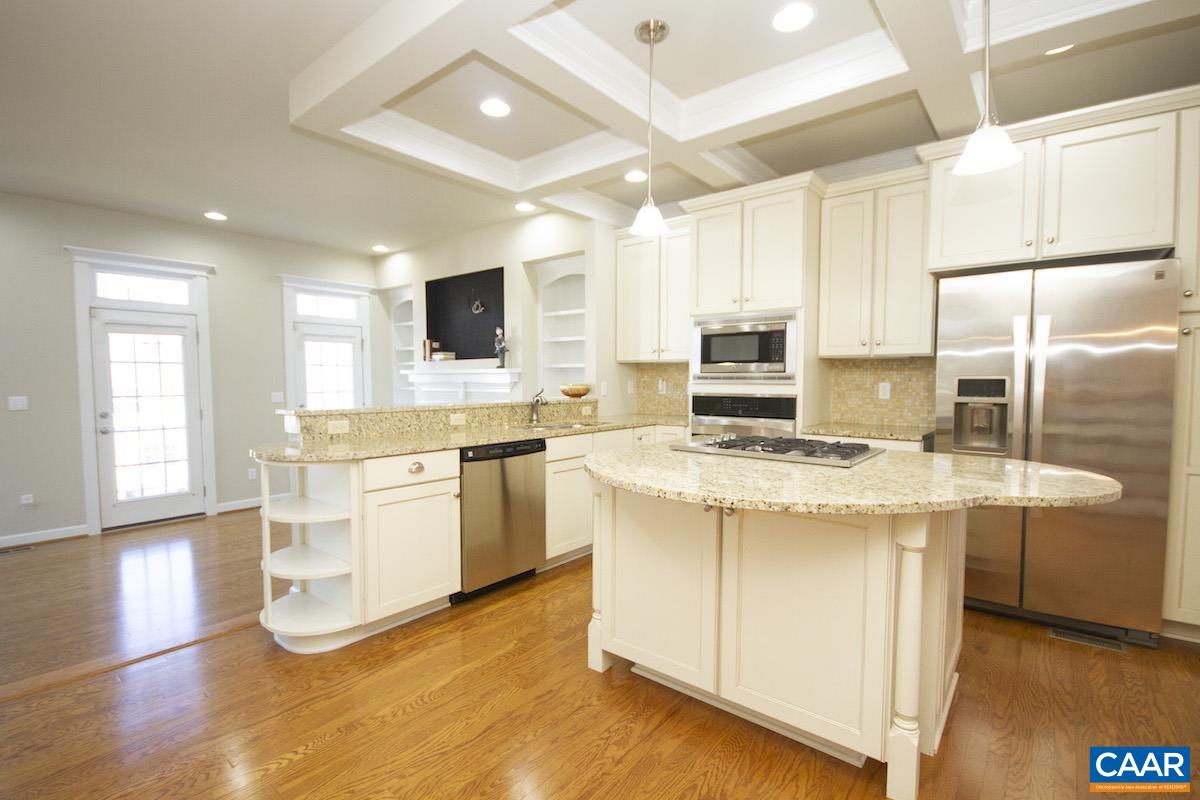 2095 Avinity Loop Charlottesville, VA 22902 - Photo 5 of 42 a kitchen with a stove a sink and a refrigerator