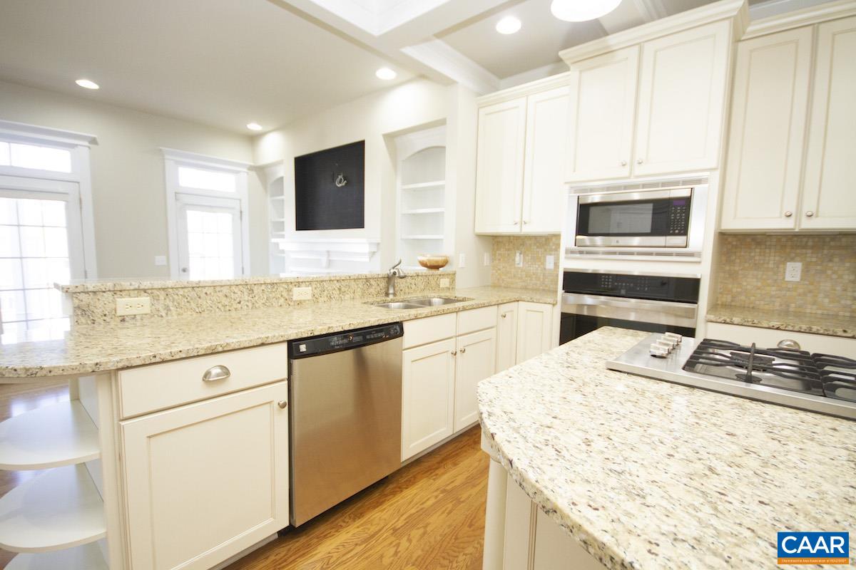 2095 Avinity Loop Charlottesville, VA 22902 - Photo 6 of 42 a kitchen with a stove microwave and sink