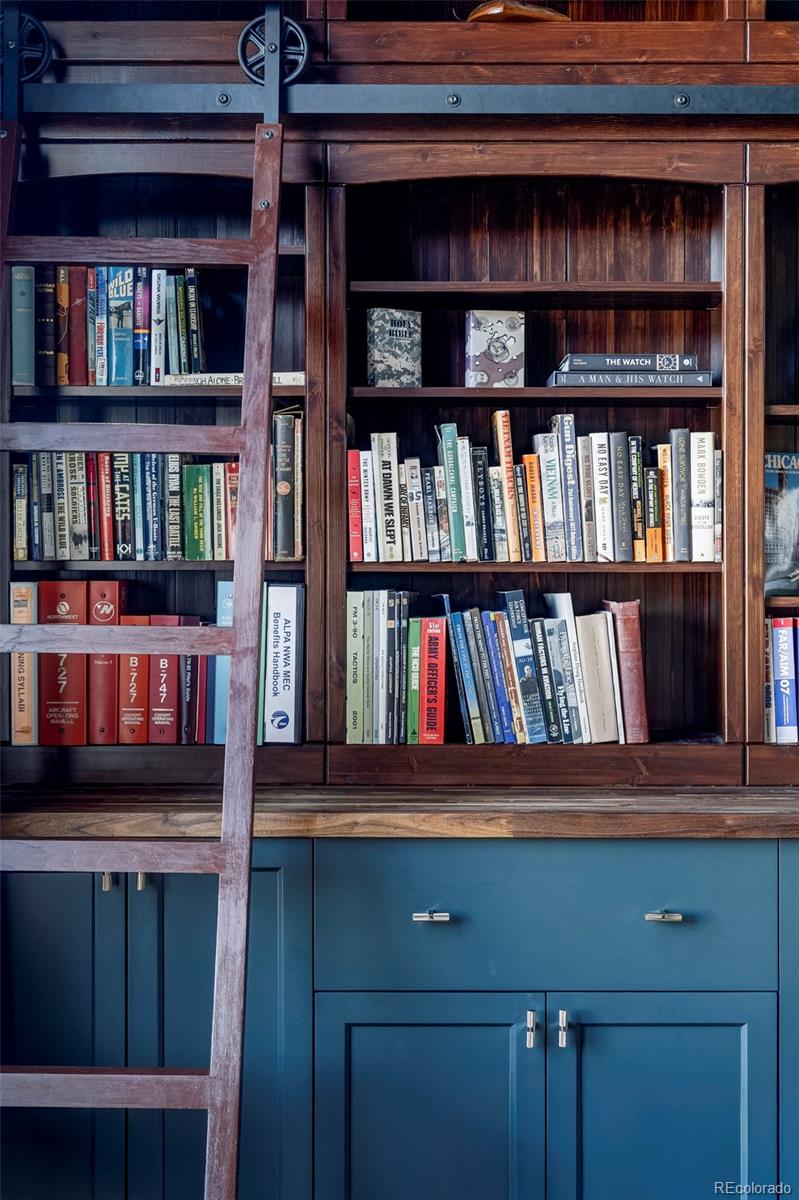 6670 Violet Way Arvada, CO 80007 - Photo 11 of 50 a view of a book shelf