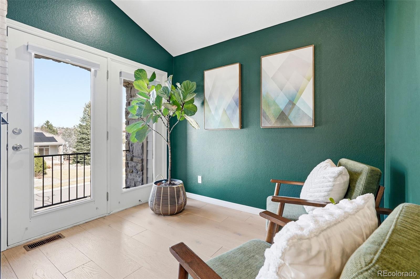 6670 Violet Way Arvada, CO 80007 - Photo 21 of 50 a bedroom with furniture and a window