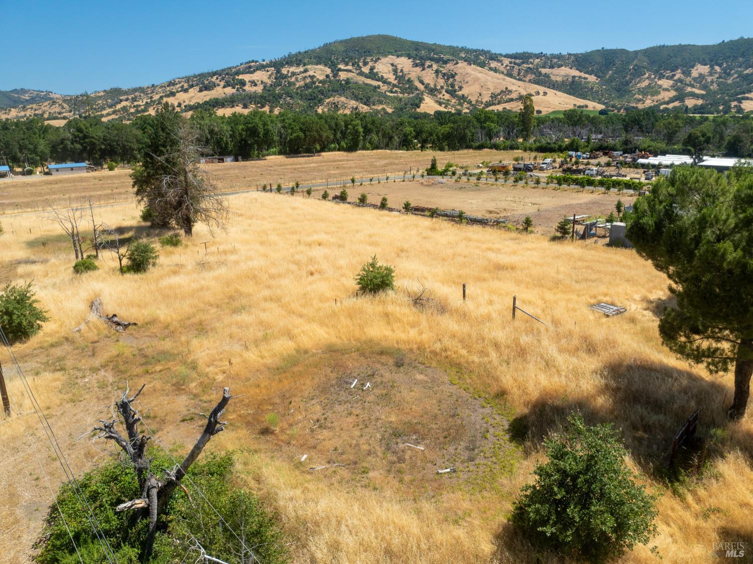 10891 West Road Redwood Valley, CA 95470 - Photo 12 of 28 a view of a lake with a mountain