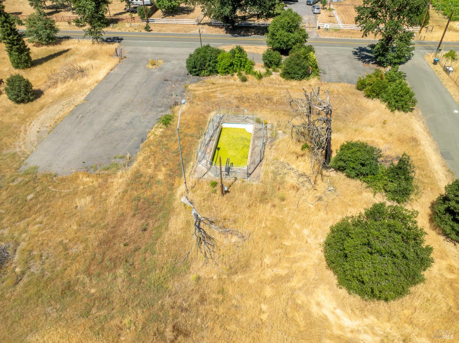 10891 West Road Redwood Valley, CA 95470 - Photo 14 of 28 a view of a swimming pool with a yard