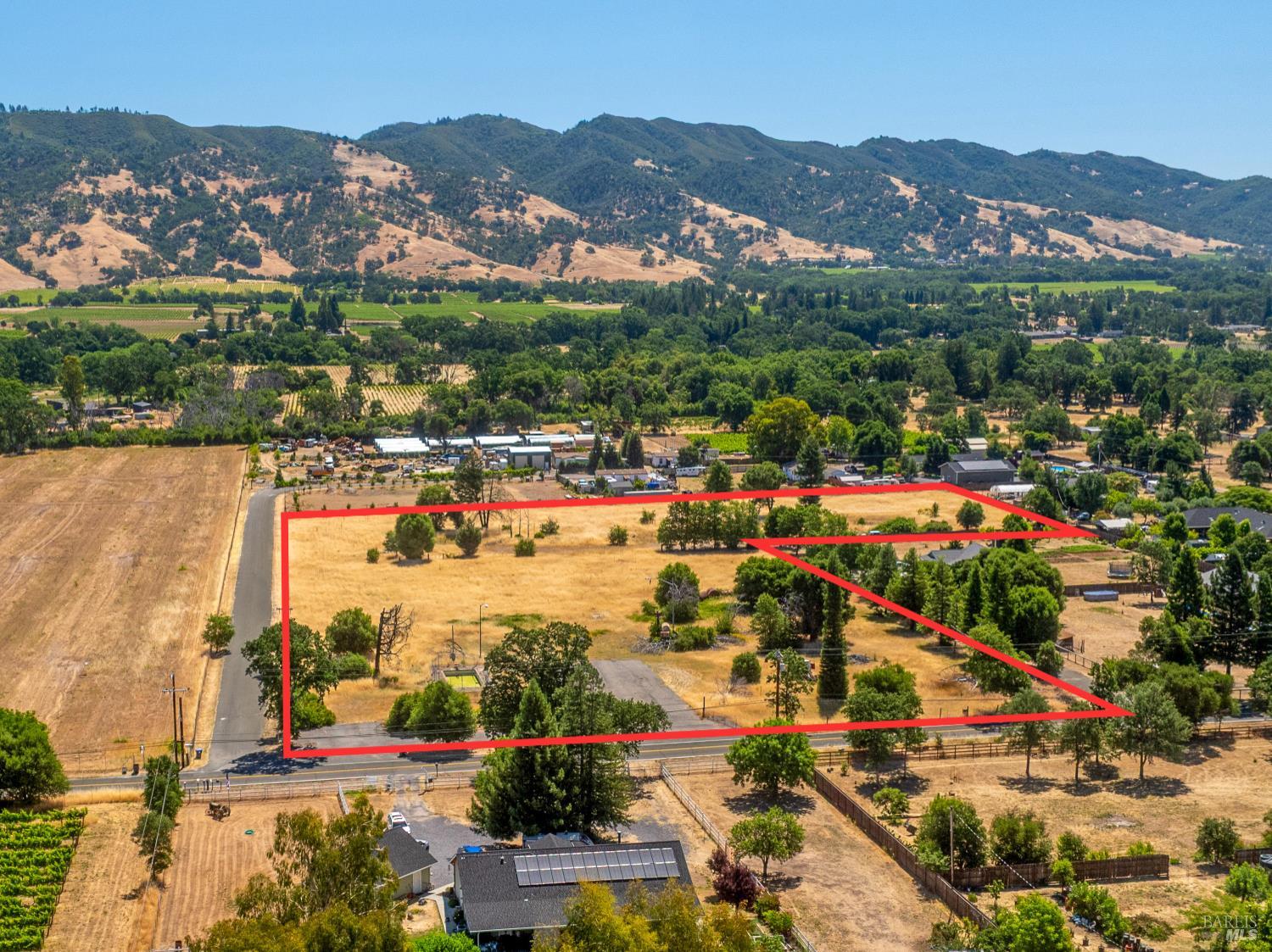 10891 West Road Redwood Valley, CA 95470 - Photo 6 of 28 an aerial view of residential building and lake