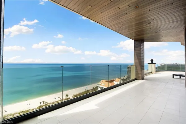 a view of swimming pool with outdoor seating