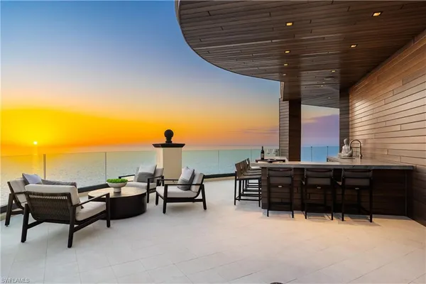 a view of a terrace with furniture