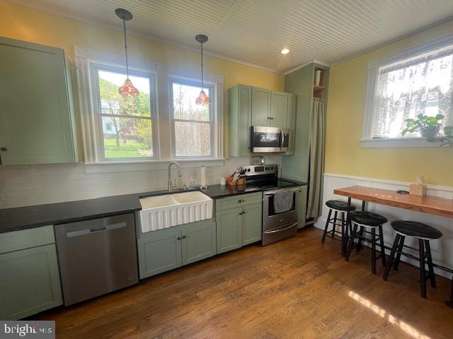 127 Biddle Street Gordon, PA 17921 - Photo 15 of 15 a kitchen with stainless steel appliances granite countertop wooden cabinets a stove a sink a dining table and chairs