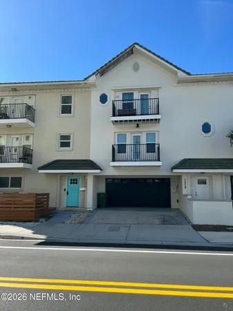 a front view of a house with swimming pool