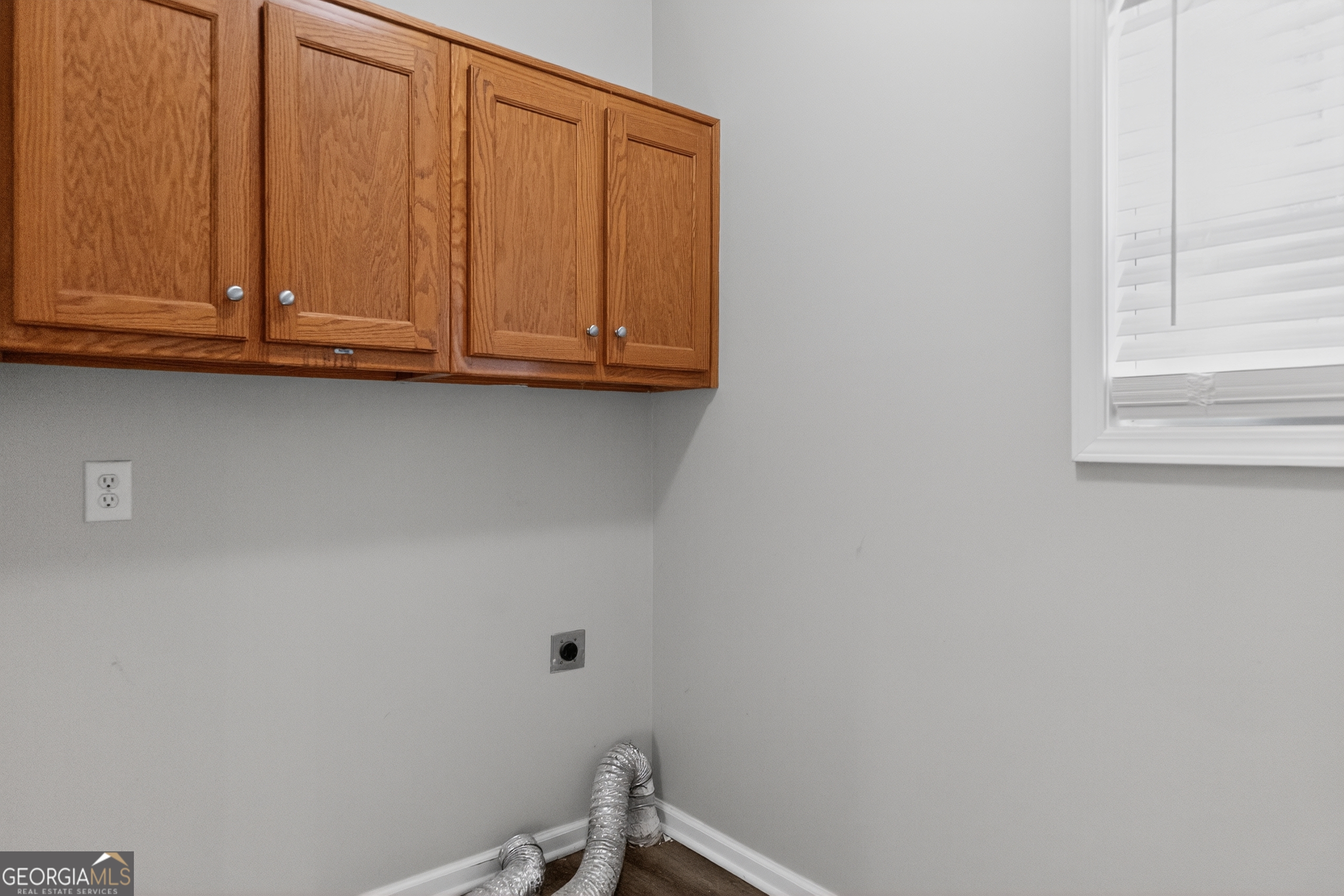 178 Rachel Boulevard Temple, GA 30179 - Photo 30 of 30 a bathroom with a sink and cabinets
