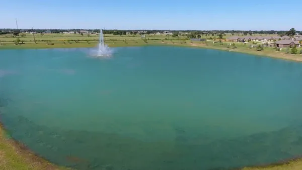 a view of an ocean and city
