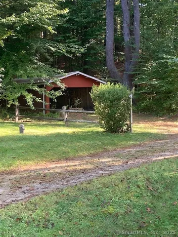 a house view with a garden space