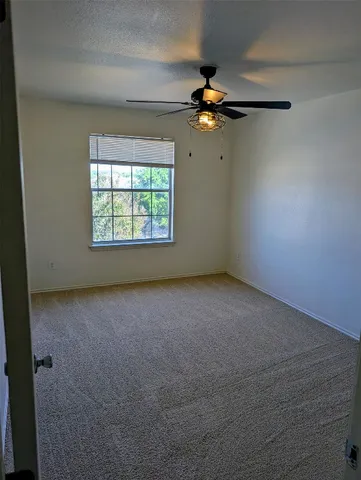 a bathroom with a sink a toilet and a shower