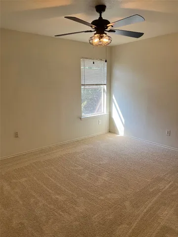 a view of a back yard of the house