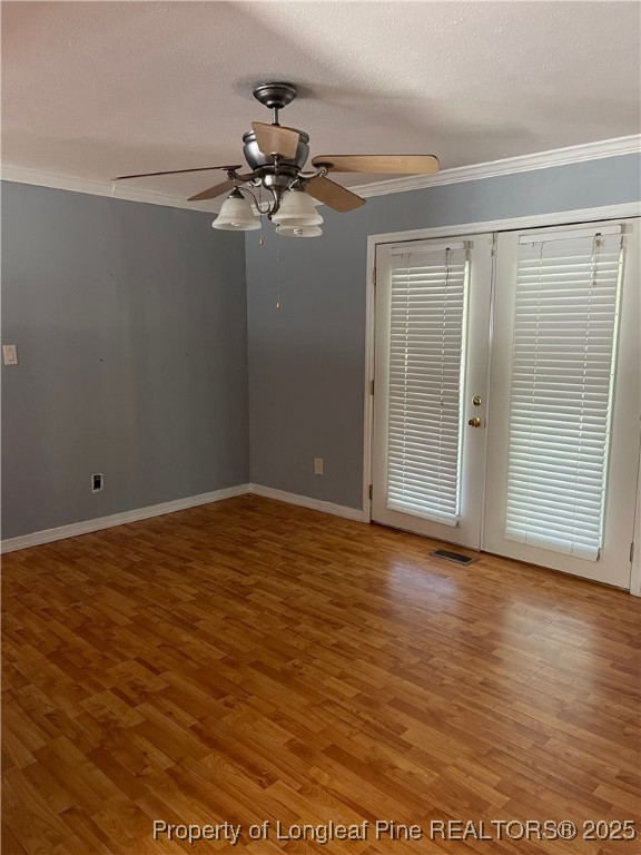 4526 Belford Road Fayetteville, NC 28314 - Photo 20 of 30 a view of an empty room with wooden floor