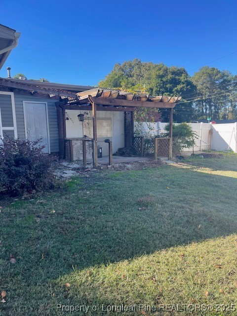 4526 Belford Road Fayetteville, NC 28314 - Photo 29 of 30 a view of a back yard of the house