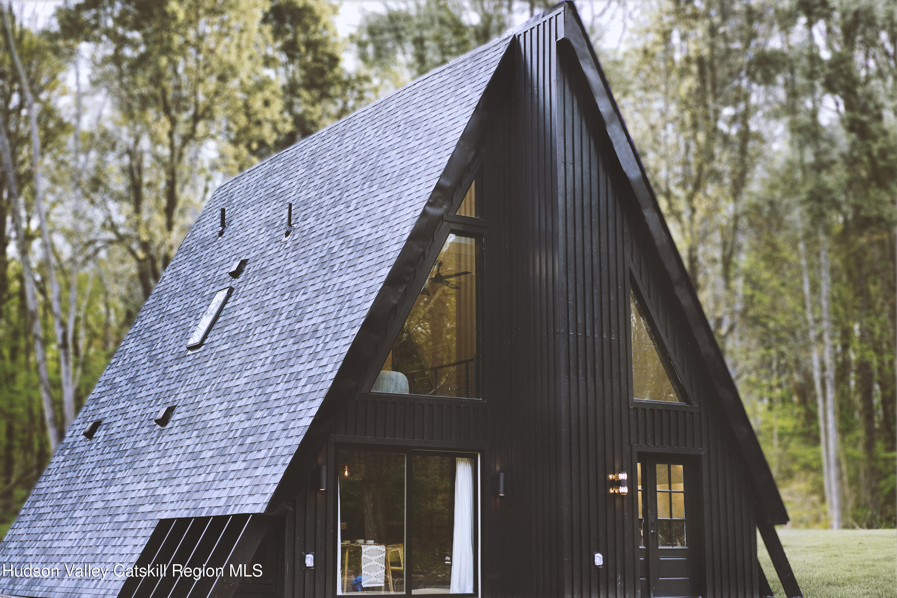 238 Grist Mill Road Tillson, NY 12486 - Photo 21 of 21 a view of a wooden door with a small yard