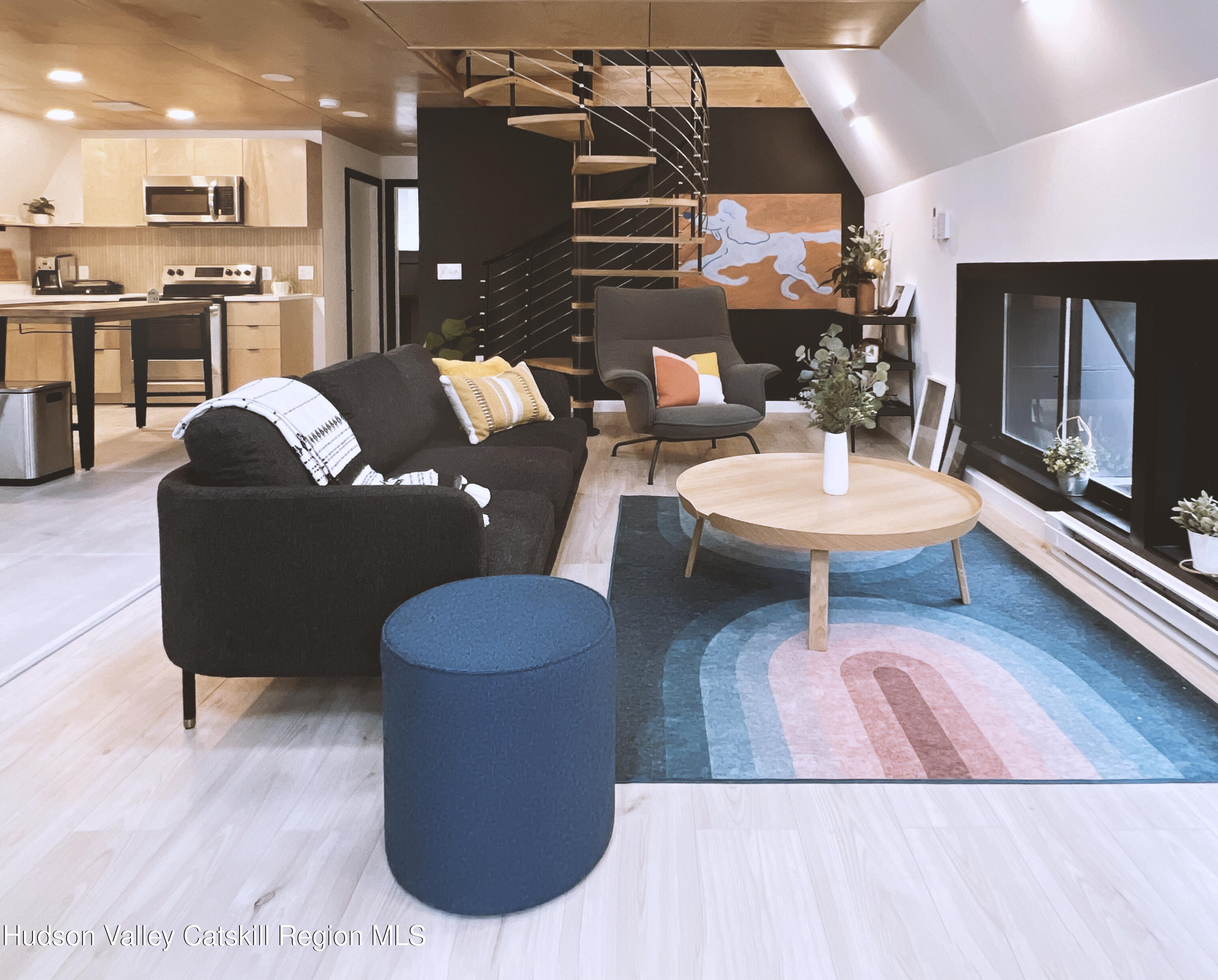 238 Grist Mill Road Tillson, NY 12486 - Photo 4 of 21 a living room with couches and a flat screen tv