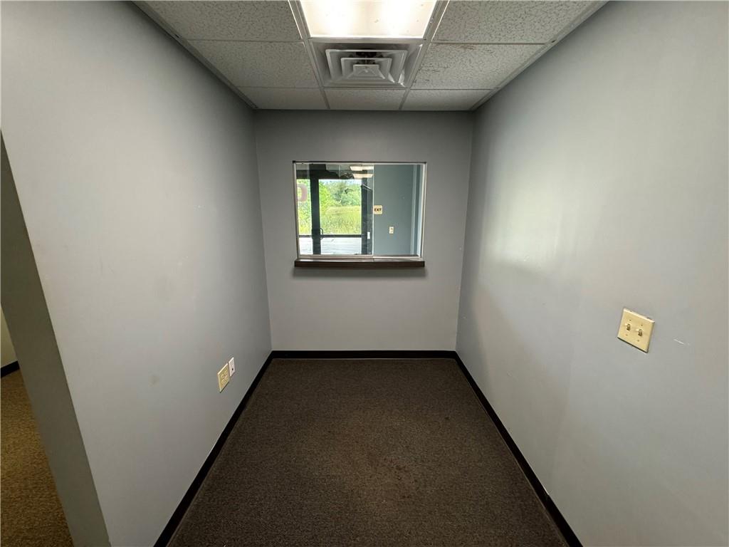 315 Green Ridge Road New Castle, PA 16105 - Photo 8 of 12 an empty room with windows