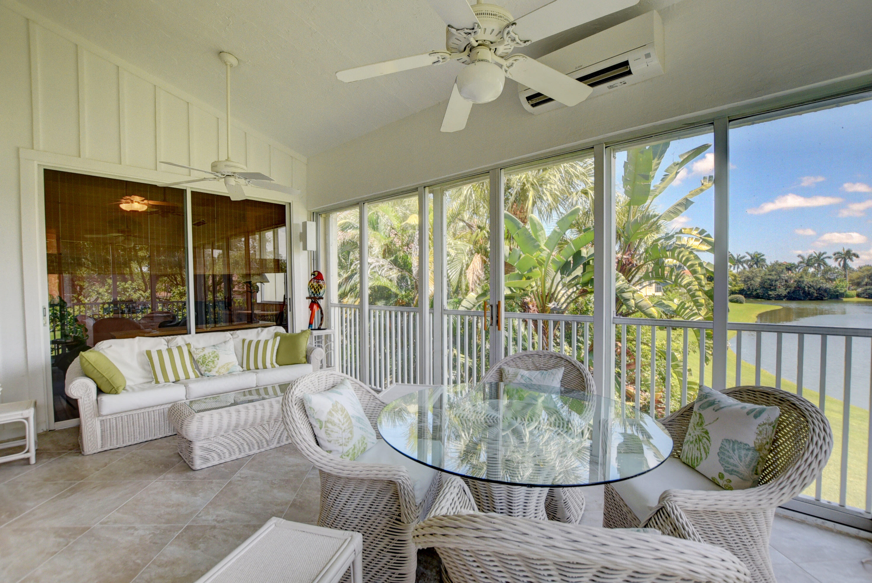 2441 Northwest 59th Street, Unit 502 Boca Raton, FL 33496 - Photo 11 of 46 Glassed/Screened In Porch