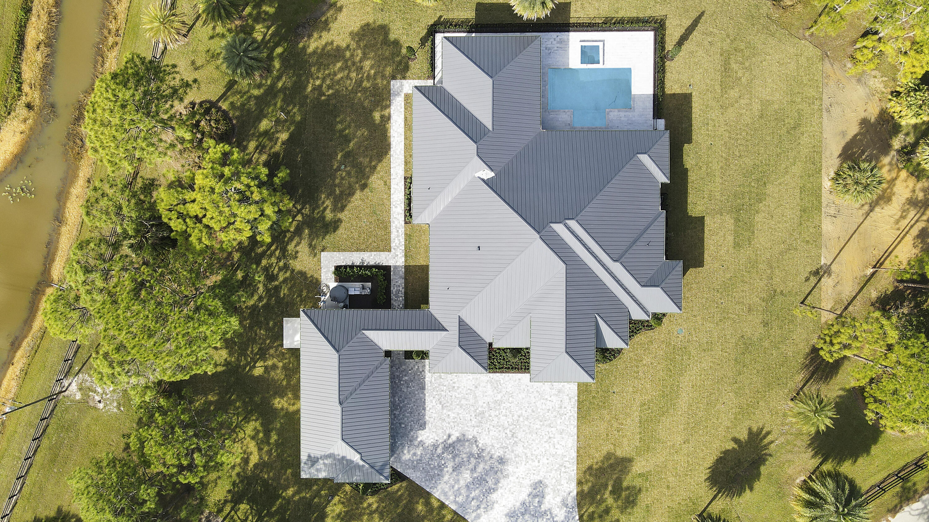 14527 Pepper Bush Drive Palm Beach Gardens, FL 33418 - Photo 19 of 81 a view of a house with a yard