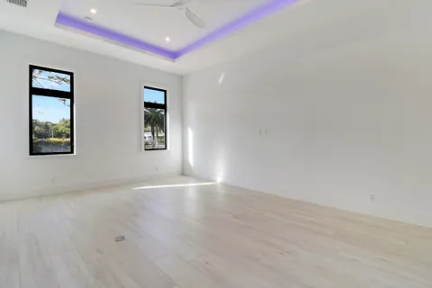 a swimming pool with wooden fence