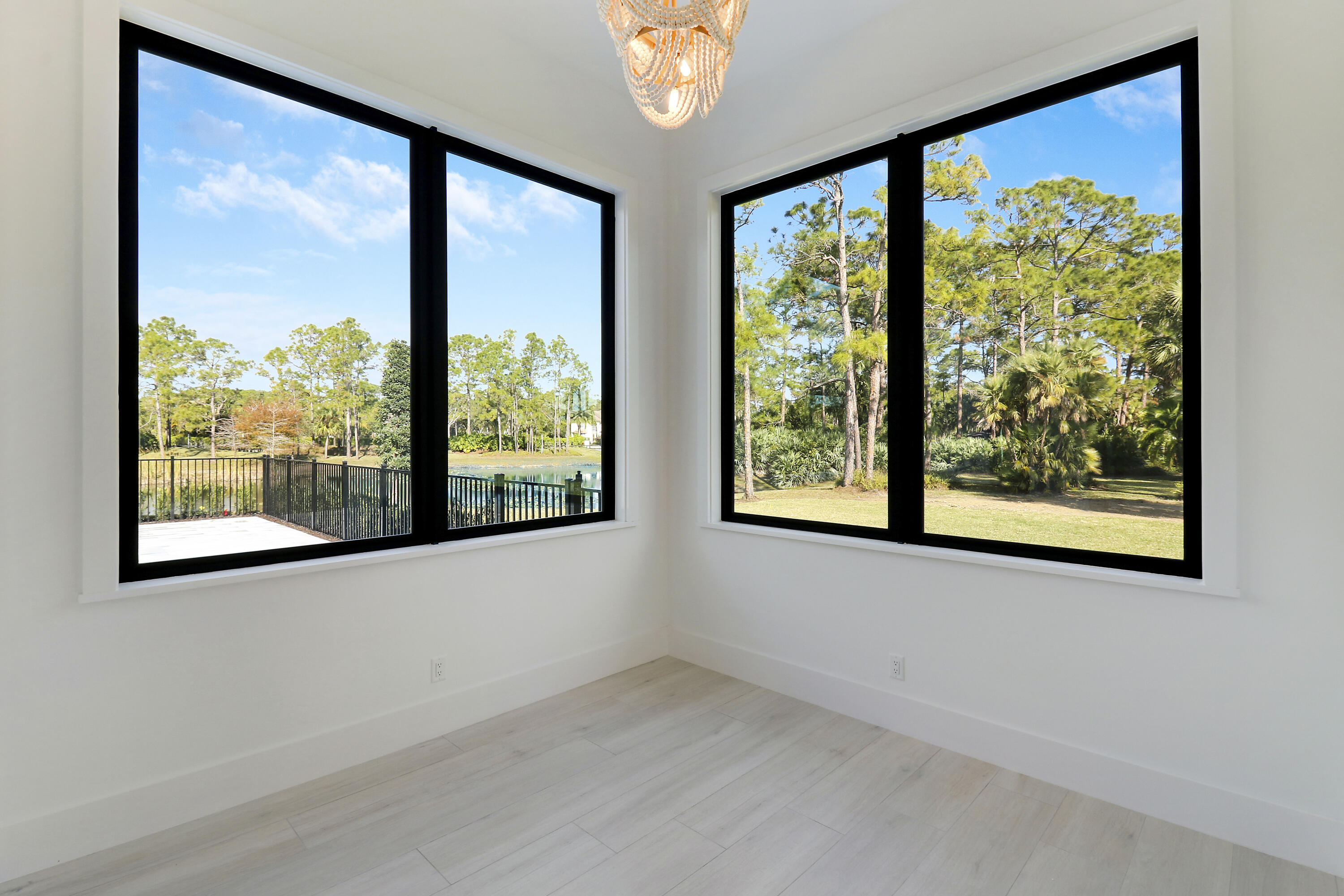 14527 Pepper Bush Drive Palm Beach Gardens, FL 33418 - Photo 5 of 81 a view of an empty room with a window