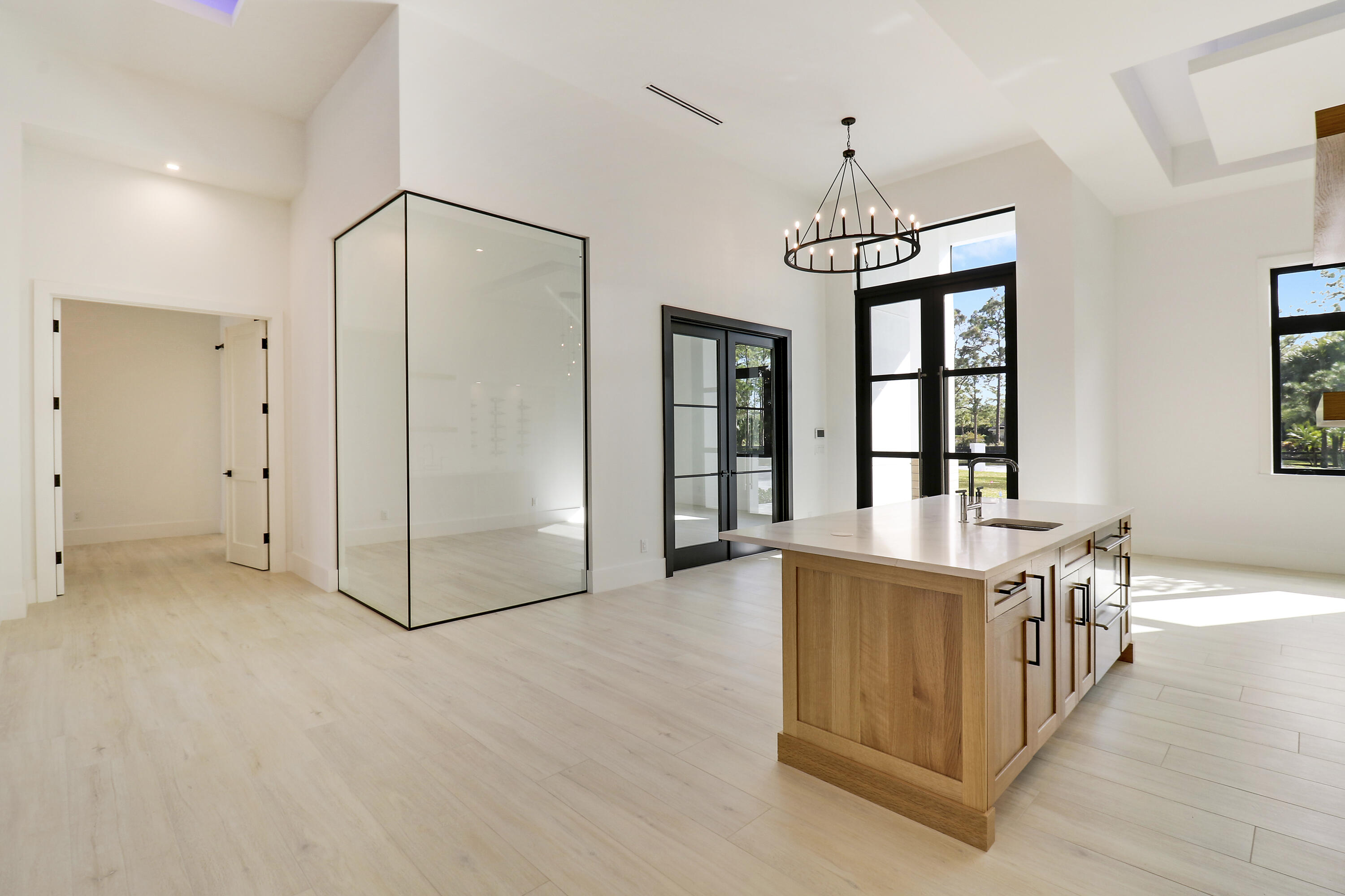 14527 Pepper Bush Drive Palm Beach Gardens, FL 33418 - Photo 54 of 81 a view of an empty room with window and wooden floor