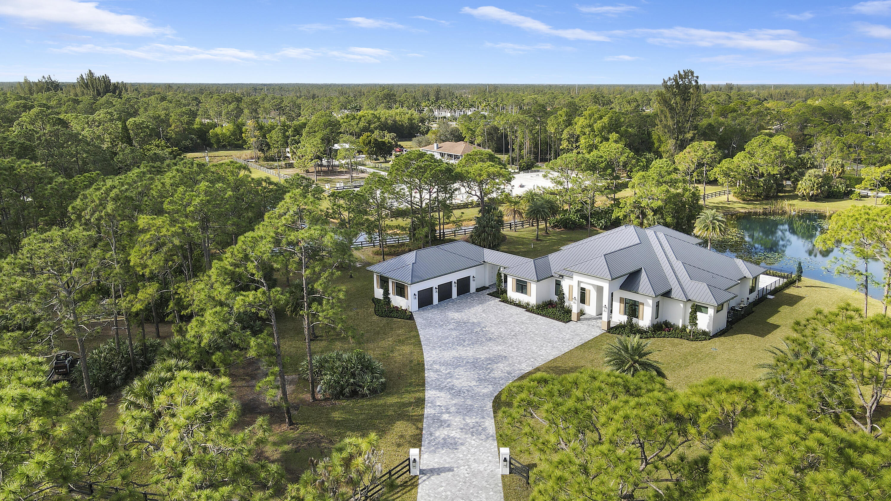 14527 Pepper Bush Drive Palm Beach Gardens, FL 33418 - Photo 73 of 81 an aerial view of residential houses with outdoor space and trees