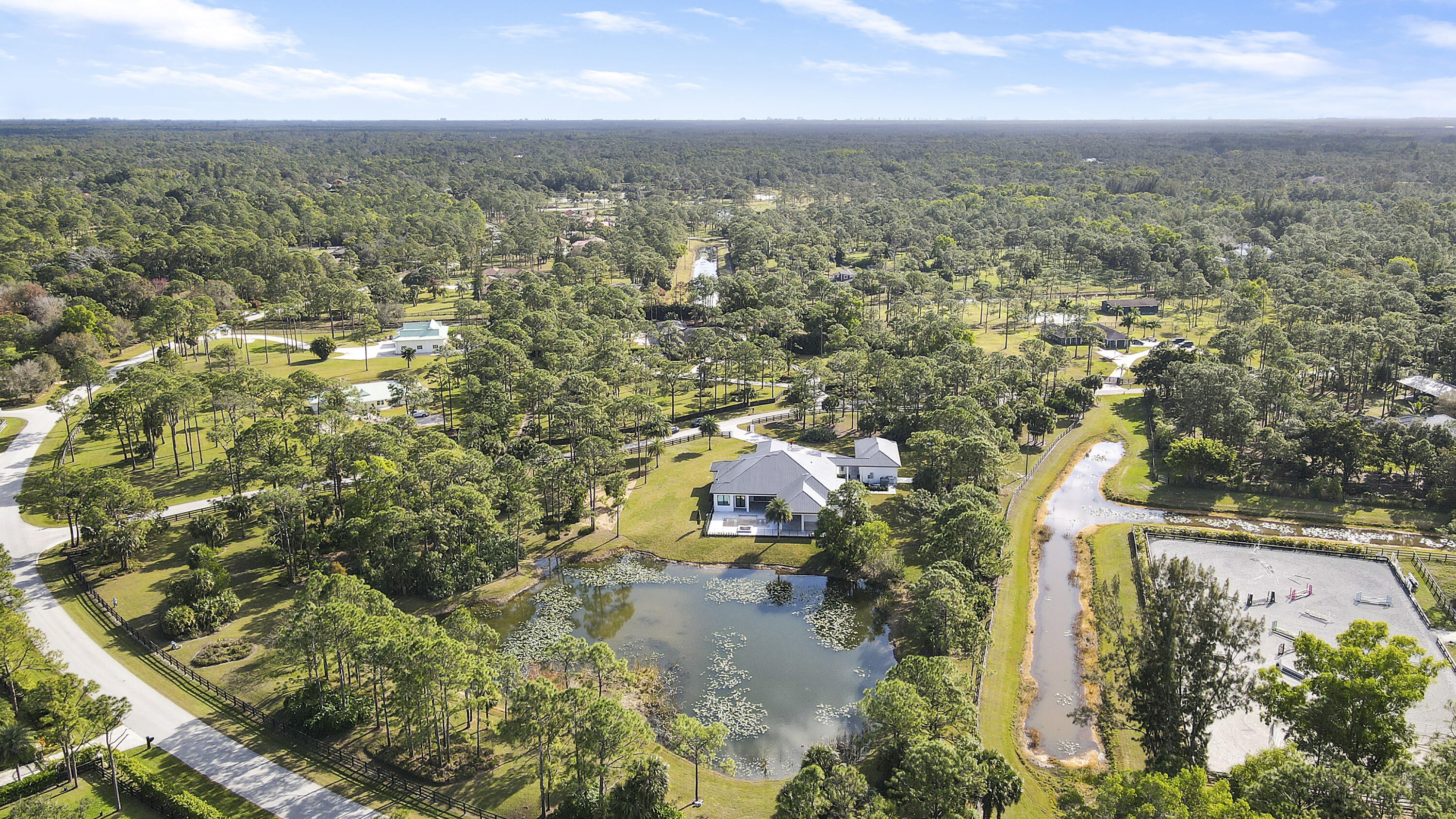 14527 Pepper Bush Drive Palm Beach Gardens, FL 33418 - Photo 78 of 81 an aerial view of residential building with green space