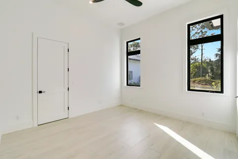 a front view of house with yard and outdoor seating