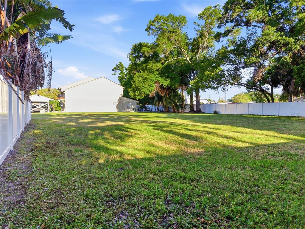 3348 West Hidden Haven Court Tampa, FL 33607 - Photo 11 of 43 a view of a swimming pool with an outdoor space and seating area