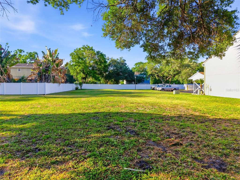 3348 West Hidden Haven Court Tampa, FL 33607 - Photo 12 of 43 a view of a swimming pool with an outdoor space and seating area