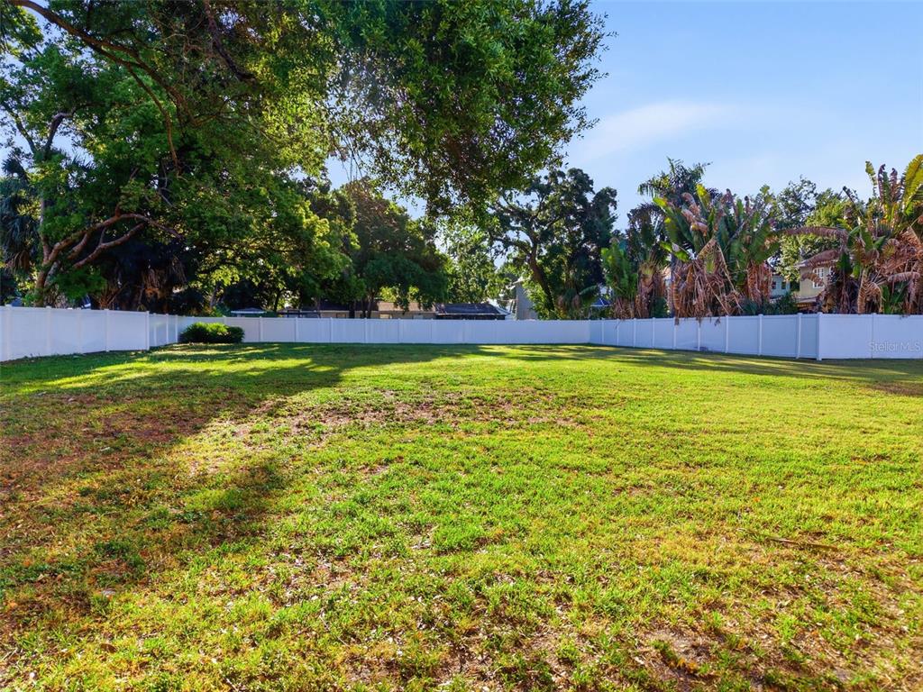 3348 West Hidden Haven Court Tampa, FL 33607 - Photo 16 of 43 a view of a swimming pool with an outdoor space and seating area