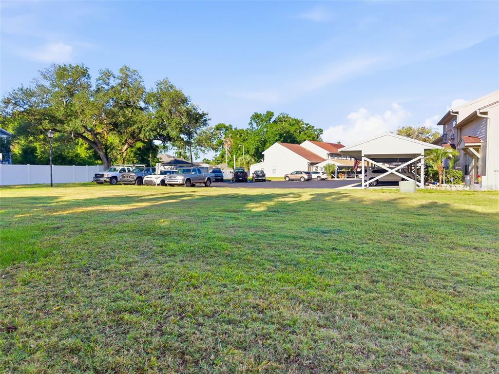 3348 West Hidden Haven Court Tampa, FL 33607 - Photo 22 of 43 a view of a town with large trees and cars park