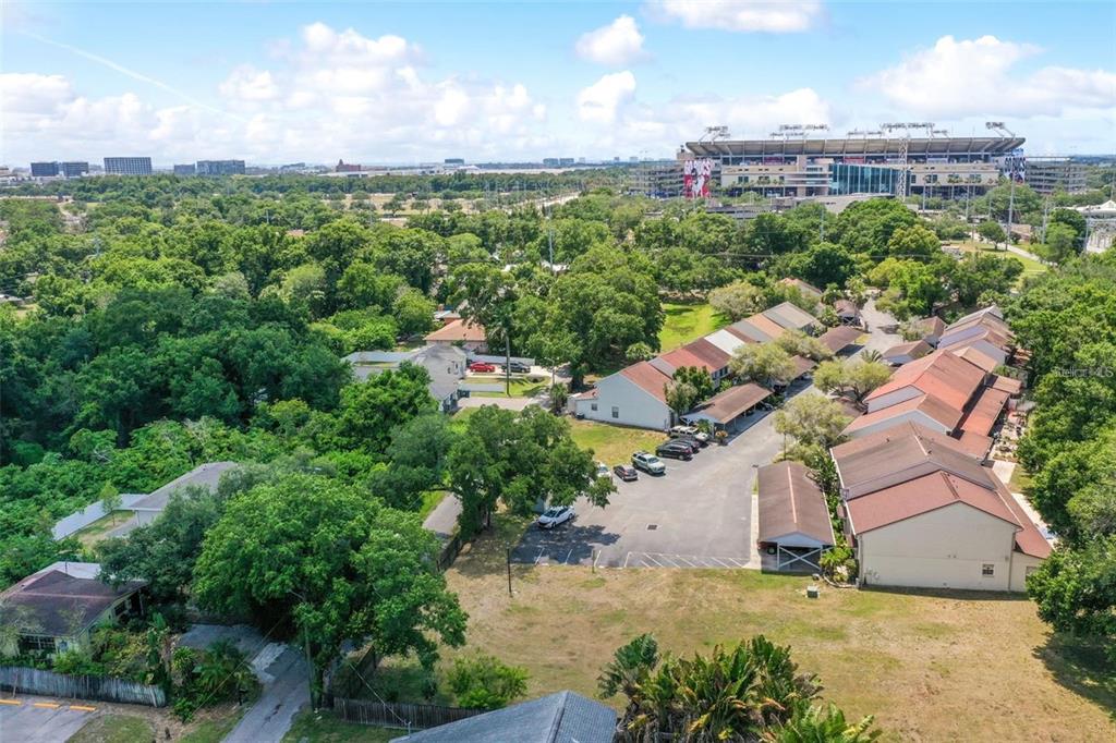 3348 West Hidden Haven Court Tampa, FL 33607 - Photo 3 of 43 an aerial view of a house with a yard and lake view