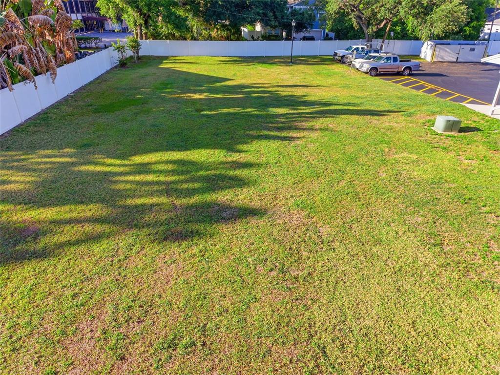 3348 West Hidden Haven Court Tampa, FL 33607 - Photo 37 of 43 a view of a swimming pool with an outdoor seating and yard