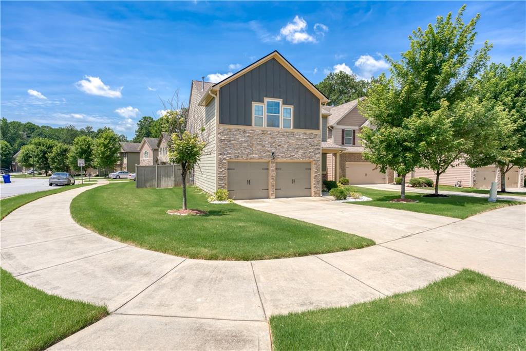 4830 Longview Run Decatur, GA 30035 - Photo 1 of 1 a front view of a house with a yard