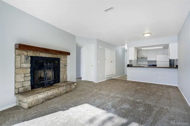 a view of a kitchen with a sink