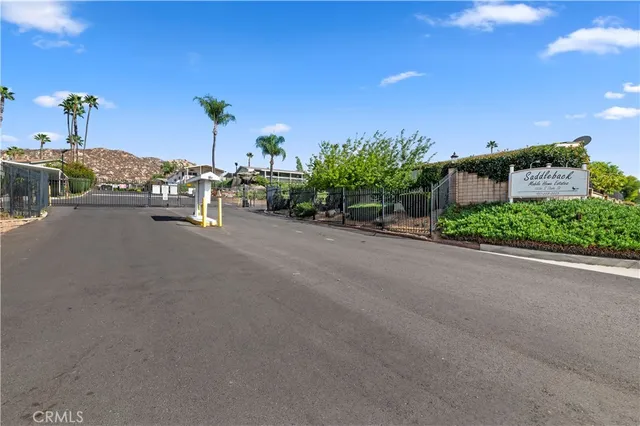 a view of a street with an house and car parked